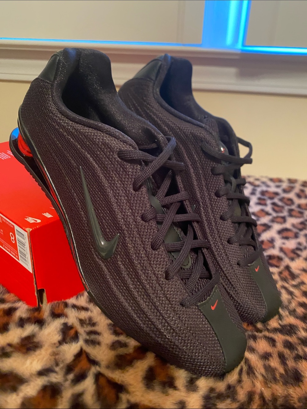 Nike Women’s Black Athletic Sneakers with Red Accents
